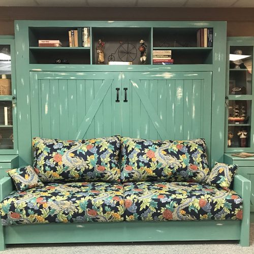 Barn Door Murphy ClosedHorizontal Barn Door face with 16" side bookcases, upper bookcase, sofa with storage and lights.